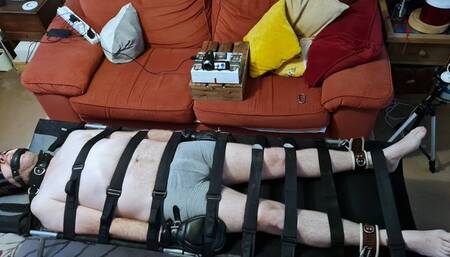 Two women torment strapped down man 3-BBW bondage,BBW domination,male bondage,man in bondage,amateur,double domination,bound and gagged man,strapped down,man tied up,