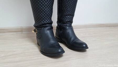 Toe Tapping in Two  Pairs of Leather Boots 2