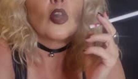 Worship the Smoking MILF Goddess as she enjoys her 120 cigarette for you in her leather outfit