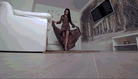 Black panties under a long leopard print dress b