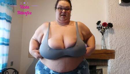 VT trying on my old tiny grey sports bra