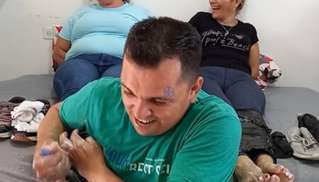 Sian and Nina are tickled by a man