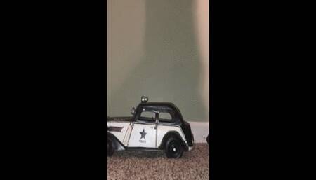 Model car stomped with cleats