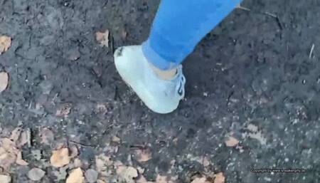 a walk in the forest with used Sneakrs in the dirt