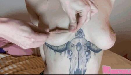 Martyreing of the soft tit meat in slowmotion