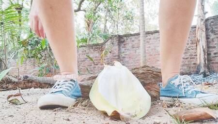 Pee in nature inside the Coconut flower shell