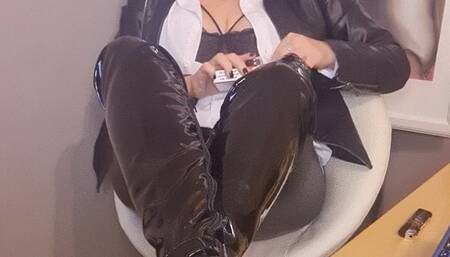Smoker Mummy answers your email in sexy leather outfit and boots, while elegantly smoking a Cork for you