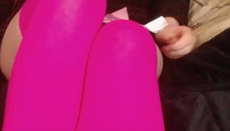 Footplay and toe wiggling in pink stockings