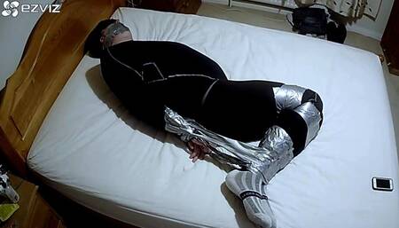 Duct taped on bed in black compression gear - Part 2 of 2 -BBW domination,BBW Bondage,man in Bondage,male bondage,amateur,man tied up,bound and gagged man,tape bondage,duct tape,duct taped,taped up,leggings,socks,struggling,hogtie,hogtied,gay bondage,