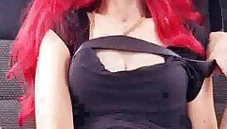 Redhead milf fucking a dildo on the backseat