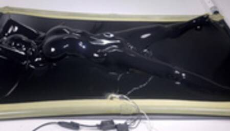 latex vacbed orgasm with vibrator and e-stim