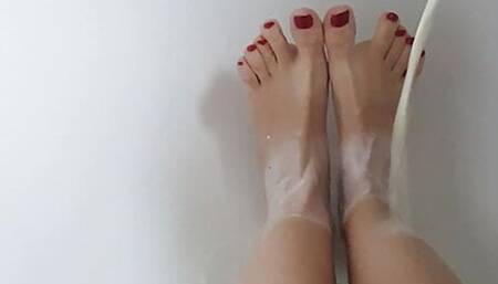 Foot massage with lube, milk and big black butt plug