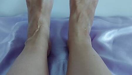 Foot fetish with red varnish, lubricant and spitting