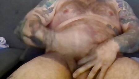 Stroking cock and cumshot