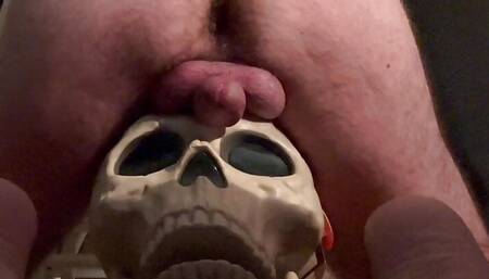 Humping A Toy Skull Cumming In The Mouth
