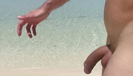 Tall guy walking naked outside beach nice body