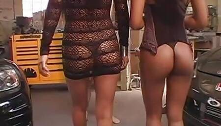 Two beautiful Asian babes give a stud the time of his life in a garage