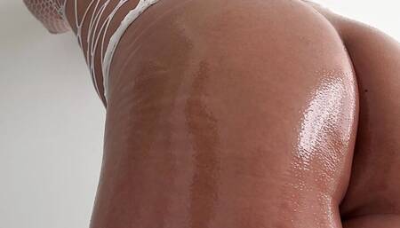 Sissy Slut Oils Ass In Fishnet Dress