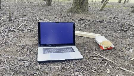 Another mac book with food destroyed with boots