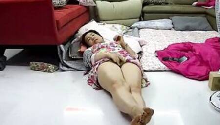 Asian mothers languid masturbation on the floor