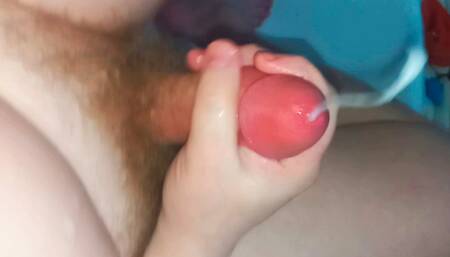 Young chubby gay jerks off cock
