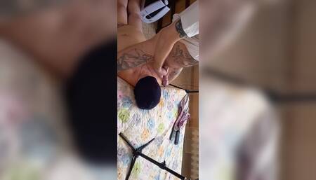A bitch with stockings on her head received a portion of sperm