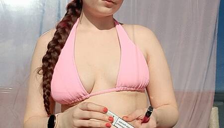 Smoking a marlboro wearing a bikini