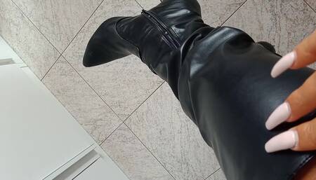 Playing with my black leather boots