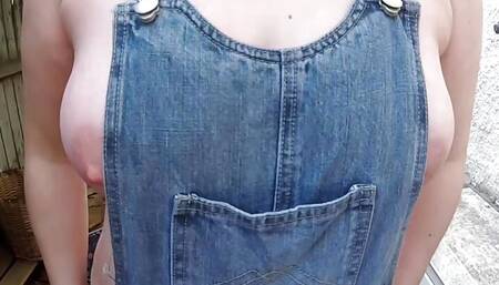 Wife in wellingtons and dungarees in the yard