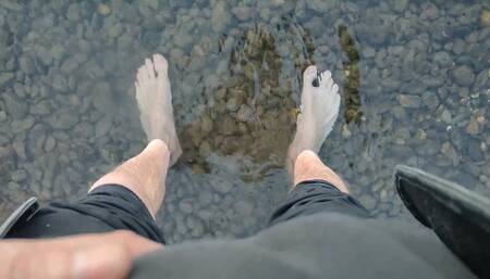 Sweaty, filthy and smelly feet in the river (avi)