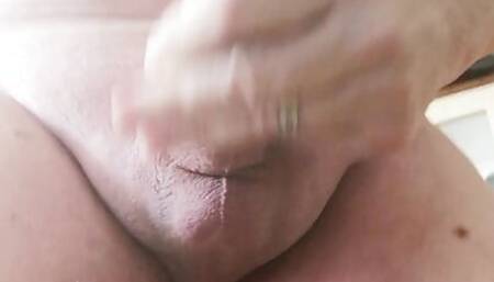 Masturbating