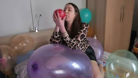 Sophie sit on a big doll balloon, blowing and nails popping Belbal 14