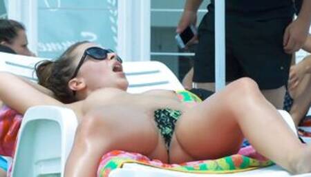 Dashing young nudists enjoy their day at the beach