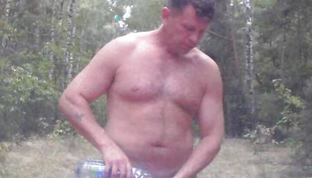 in the forest, he finished in the girl and washed his penis.