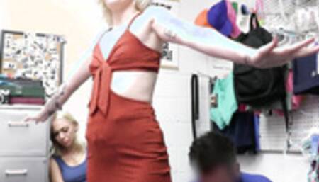 Security officer brings blonde suspects to the backroom