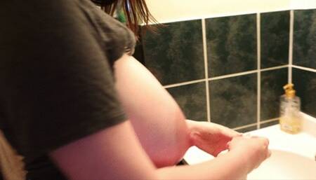 Ava washing her big nipples 1