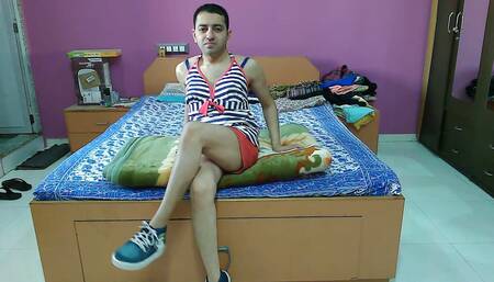 Sexy sissy crossdresser in red shorts and helther neck top getting naked