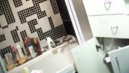 Spying on stepmom playing in front of the sink