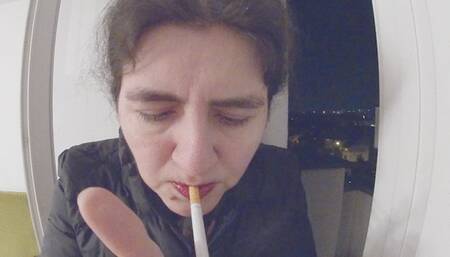 Evening smoking with violet lips