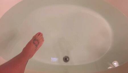 Carissa in the sheer black dress in the bathtub set to music