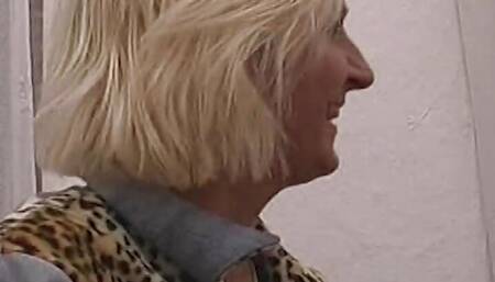 An old German lady enjoys fingering and rubbing her shaved vagina