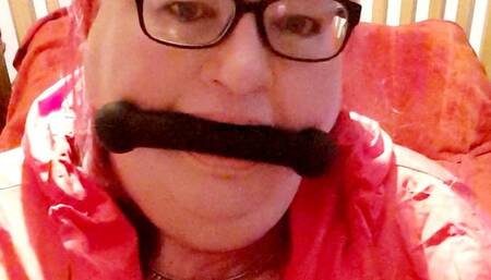 Red raincoat bed bondage- BBW bondage,cagoule,rainwear,struggling,bed bound, amateur,gagged woman,