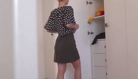 Hot blonde stripping to change into different sexy outfits