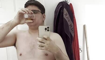 21yo boy peeing in a transparent cup, and drinks his own pee (in front of the mirror)