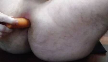 Anal masturbation with a carrot, cum at the end