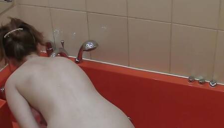 Filming my naked girlfriend refreshed in the bathtub