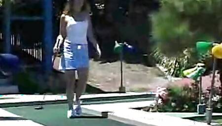 Little April outdoors enjoying solo play