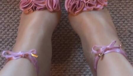 My sexy legs wearing super shiny layered pantyhose and sexy pink high heels.
