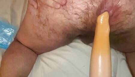 Fat pig slut rides rubber fist