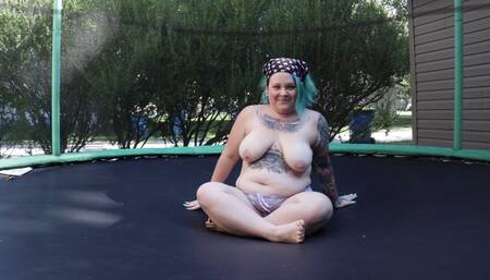 Fat Tattooed Milf Jumping and Stripping on a Trampoline